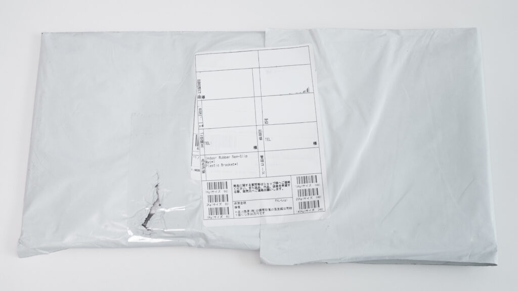 ビニール袋に包まれたKEEBMAT 80HE